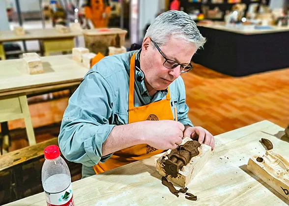 Our guest is making terracotta warrior figure.
