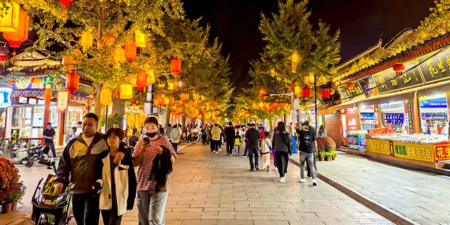 Ancient City with Many Tourists in Holiday