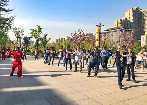 Playing Tai Chi in Sunny Weather