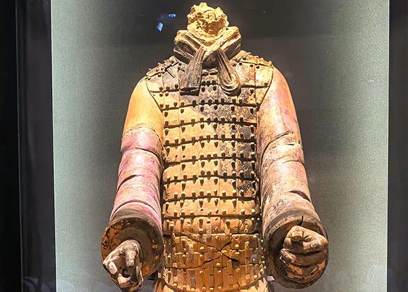 Terracotta Figure with Purple Sleeves