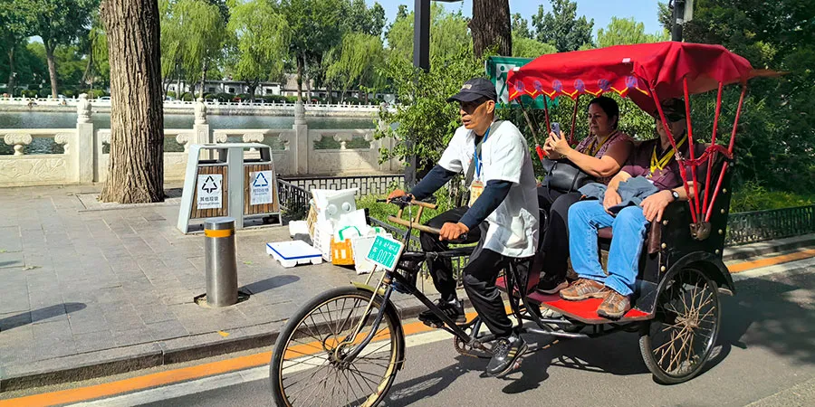 Tourists Traveling by Rickshaw