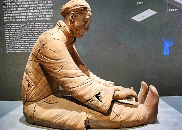 Sitting Terracotta Figure