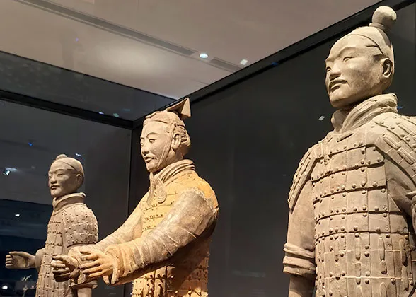 Ears of Charioteer and Cavalry Figures