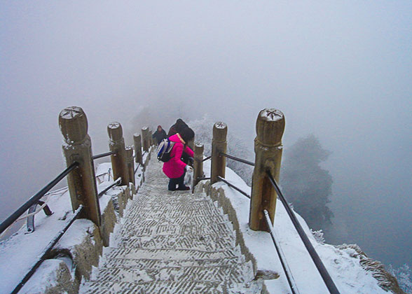 Challenging Hiking on Foggy Day in Winter