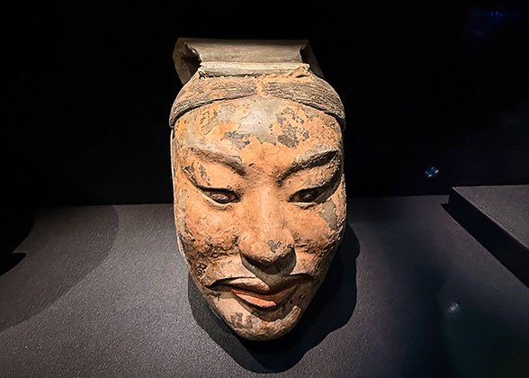 Smiling Colored Terracotta Figure