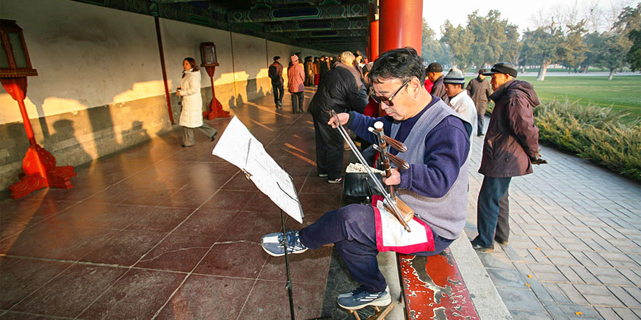 A Local Playing Traditional Chinese Musical Instrument Erhu, Long Corridor, Beijing Temple of Heaven