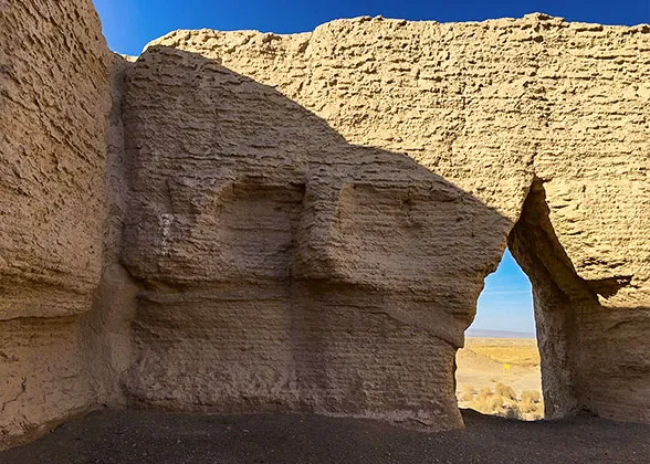 Yellow rammed earth wall