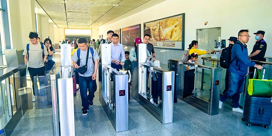 Passengers Scanning the Transportation Code Passengers Scanning the Transportation Code